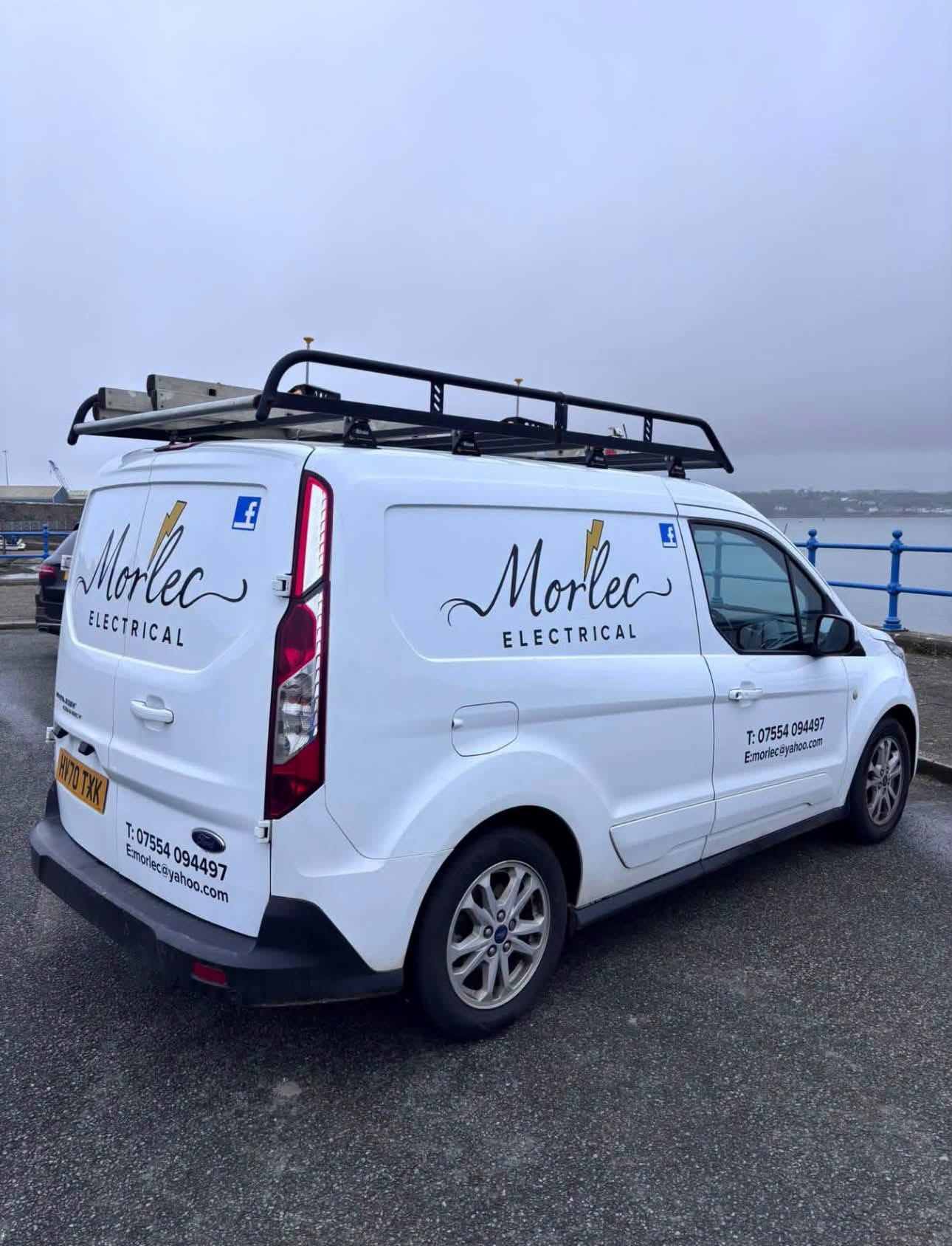 The Morlec Electrical branded van parked on the Pembrokeshire waterfront